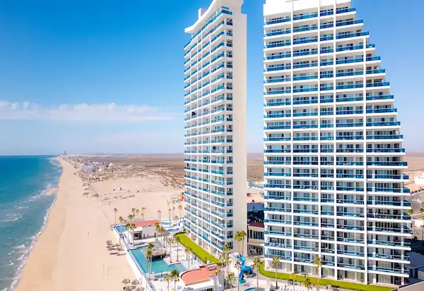 Standing as the tallest building in the State of Sonora, comprises three grand structures, each towering 24 stories high. Within each of these structures, you'll find a collection of approximately 100 condos.